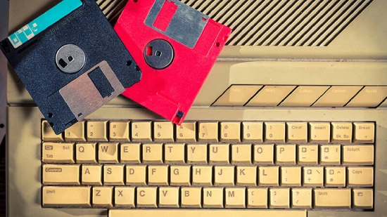 Legacy System - Old keyboard and floppy disks